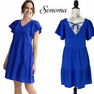 NWOT seersucker, V-neckline, tiered, blue dress.
Size L. Sonoma Goods For Life.